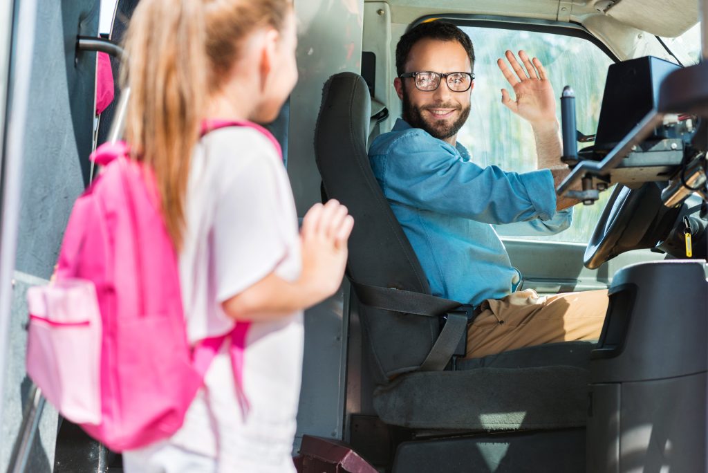 smiling bus driver greeting schoolgirl who enterin 2022 12 16 19 11 23 utc 1 - Rheingoldbus Wuppertal
