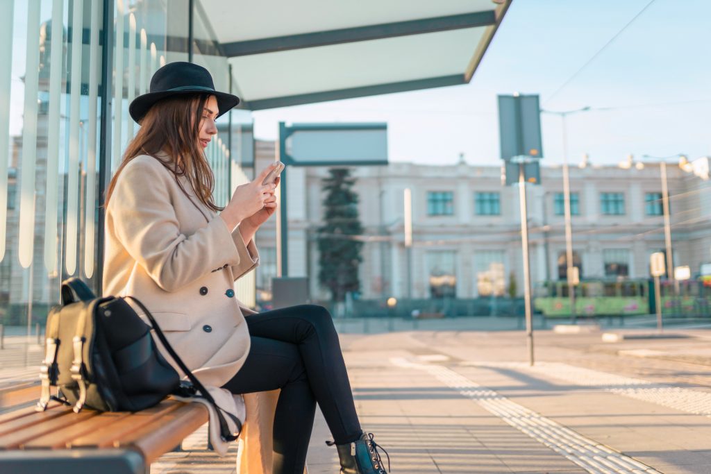 tourist girl sits at public transport stop and loo 2023 11 27 05 12 22 utc - Rheingoldbus Wuppertal